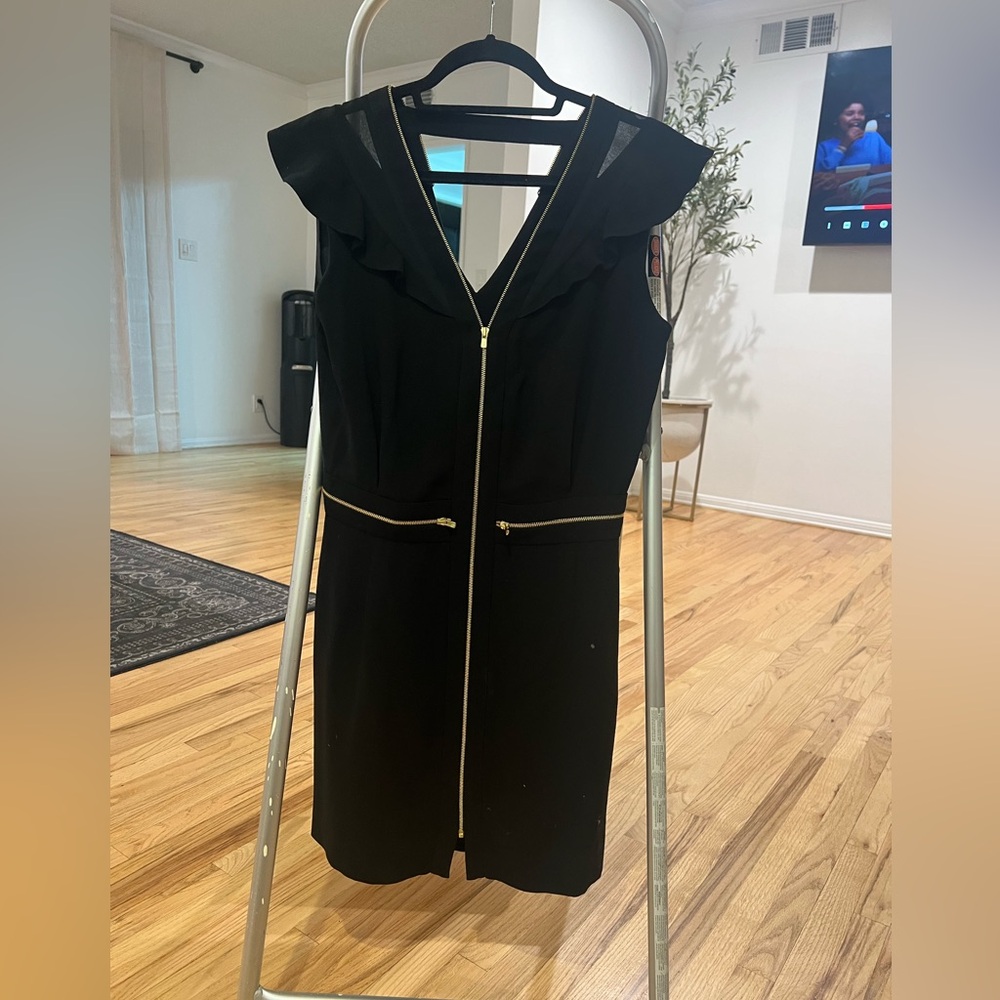 Beautiful women black dress with gold zippers size 2